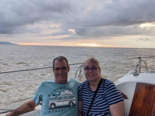 Man and woman on boat enjoy Puerto Vallara SunSet Tour