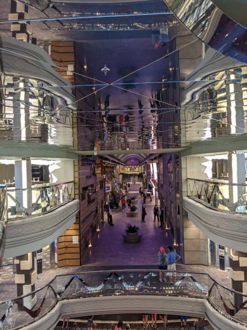 Purple lit Expansive Atrium level on MSC Meraviglia