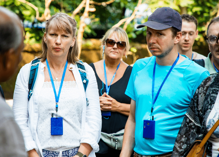 A group of people taking a tour in a foreign land use the phrases in Tagalog they they learned for a trip<br />
