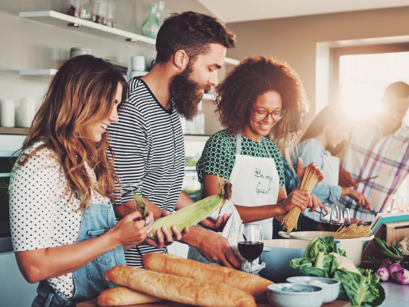 couple at a cooking class that they booked as a special experience with hotel reward points.