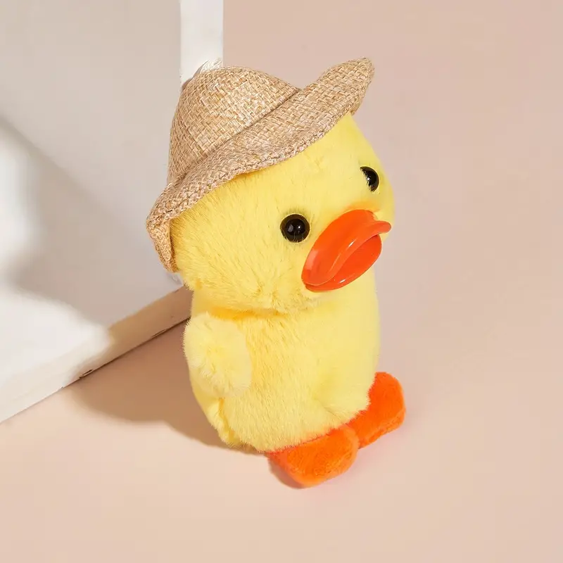 Small yell plush duck with the cutest straw hat. 