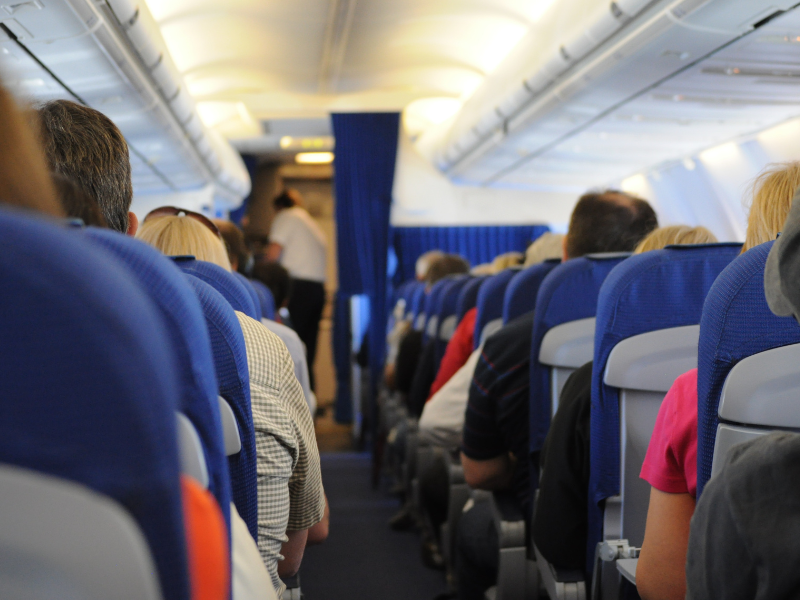 passengers wait on tarmac to take off during a delay