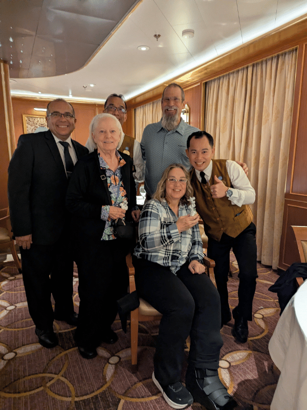 Cruise crew L to right:<br />Sergio, Ellie, and Kitty