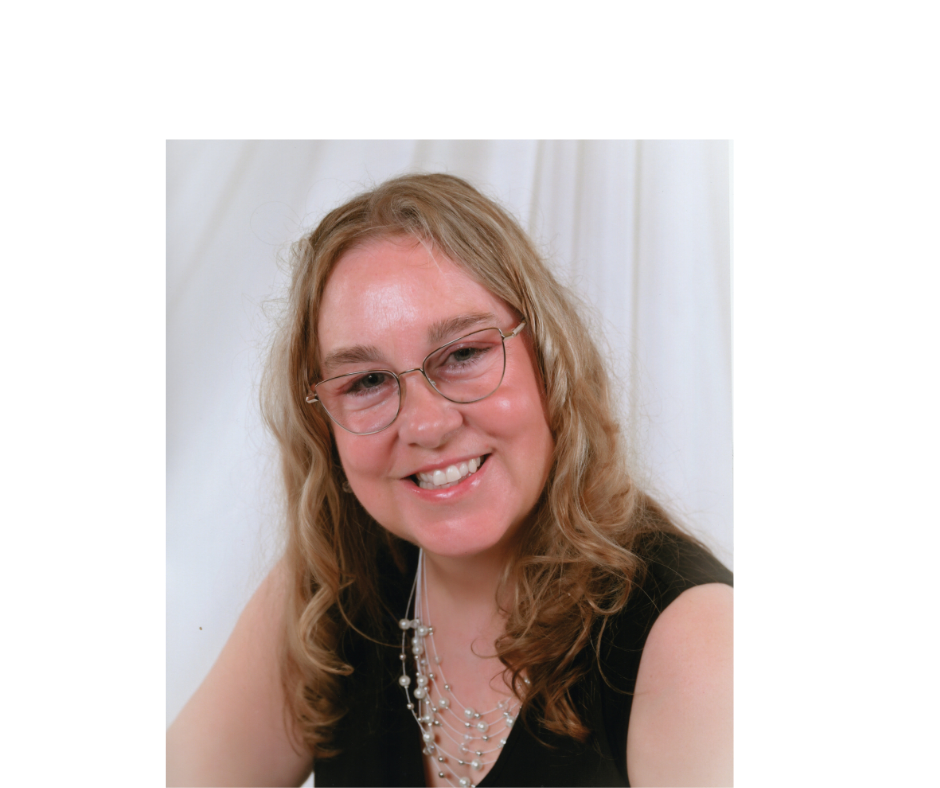 friendly lookin woman smiles at camera