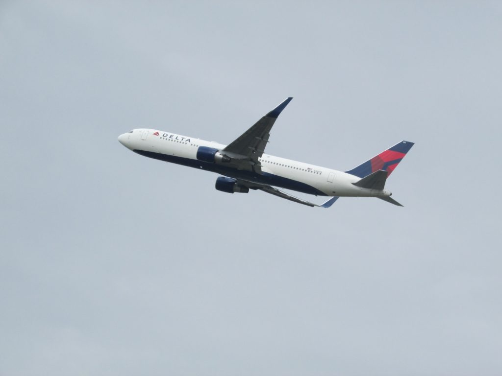 Delta airplane gaining altitude at take off